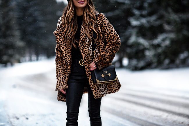 fashion blogger mia mia mine wearing a prada cahier bag and leopard coat