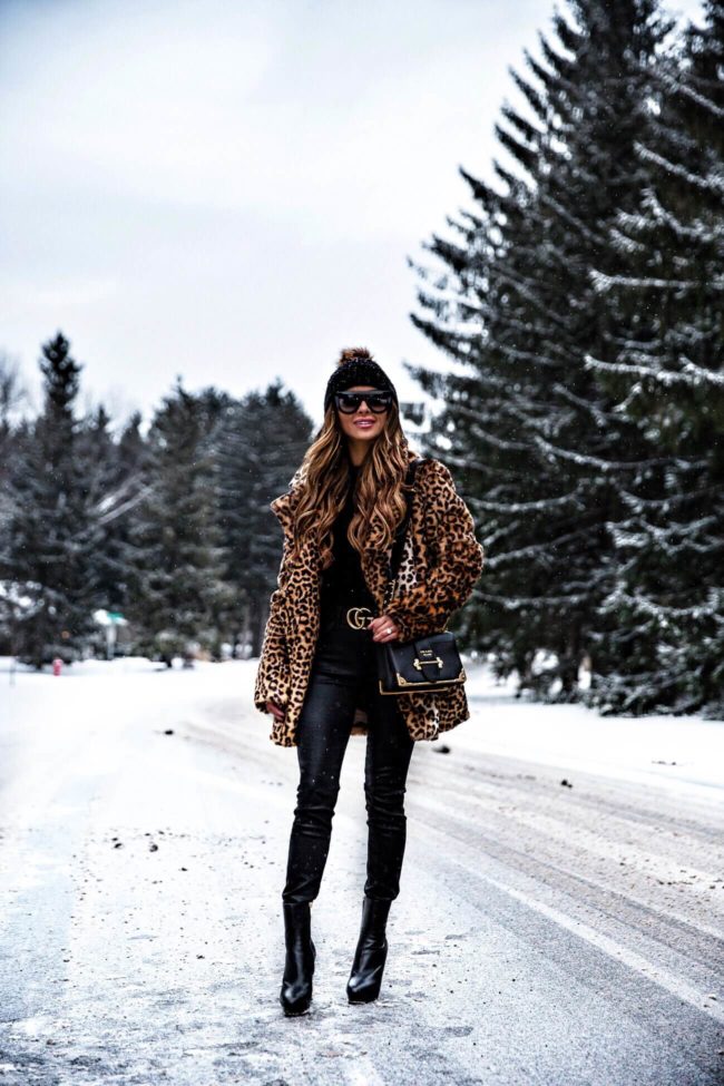 mn fashion blogger mia mia mine wearing a leopard coat and prada cahier bag