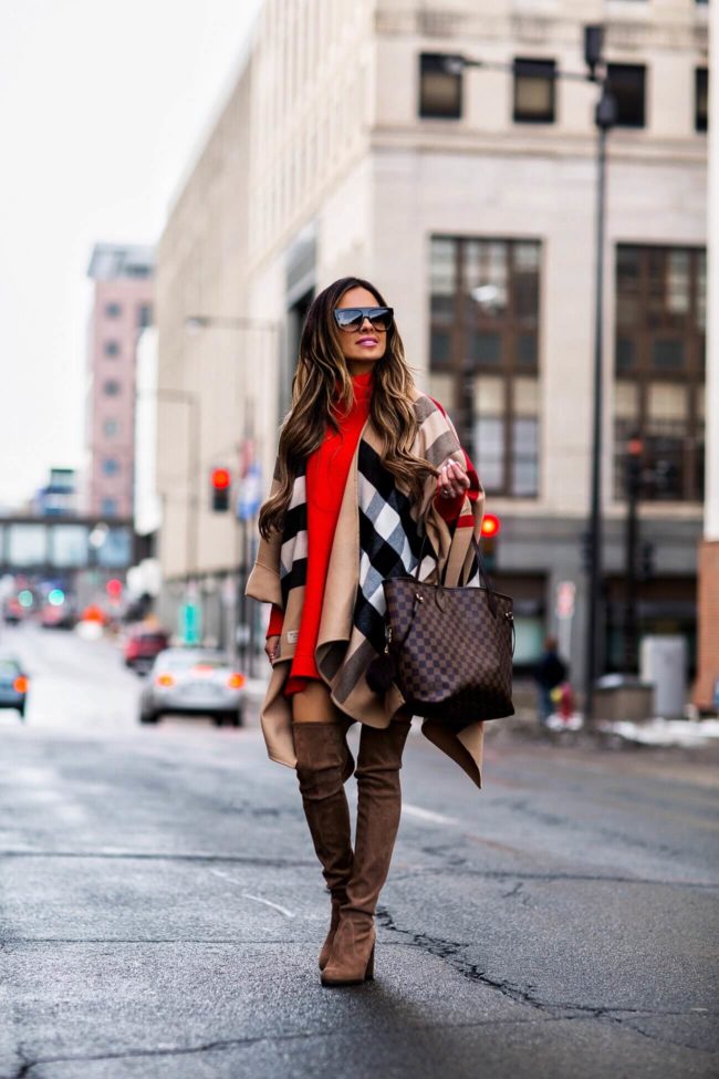 fashion blogger mia mia mine wearing a burberry cape and louis vuitton neverfull
