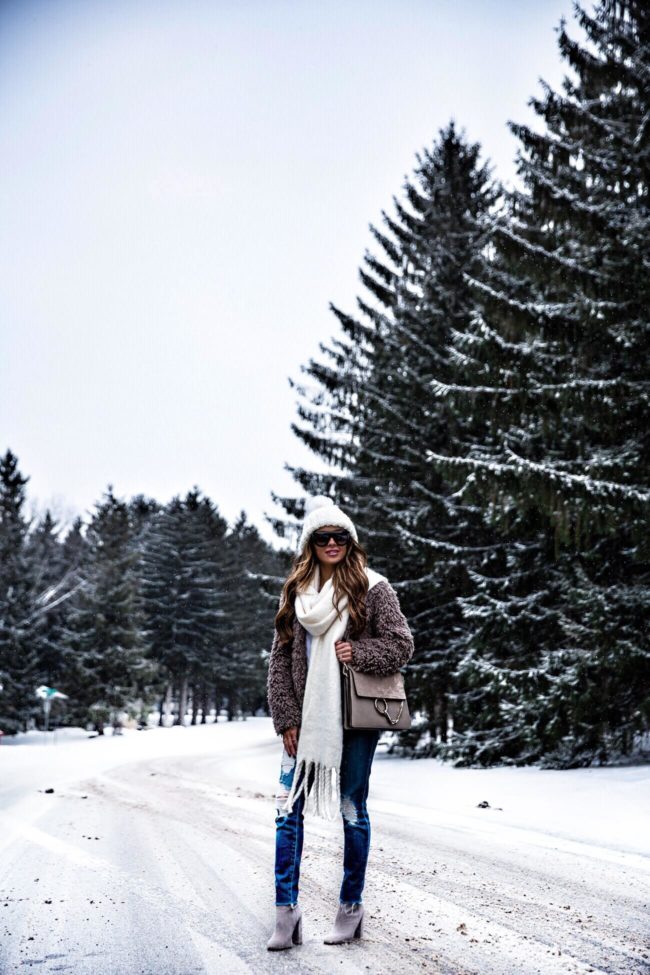 fashion blogger mia mia mine wearing a faux fur jacket from bloomingdale's