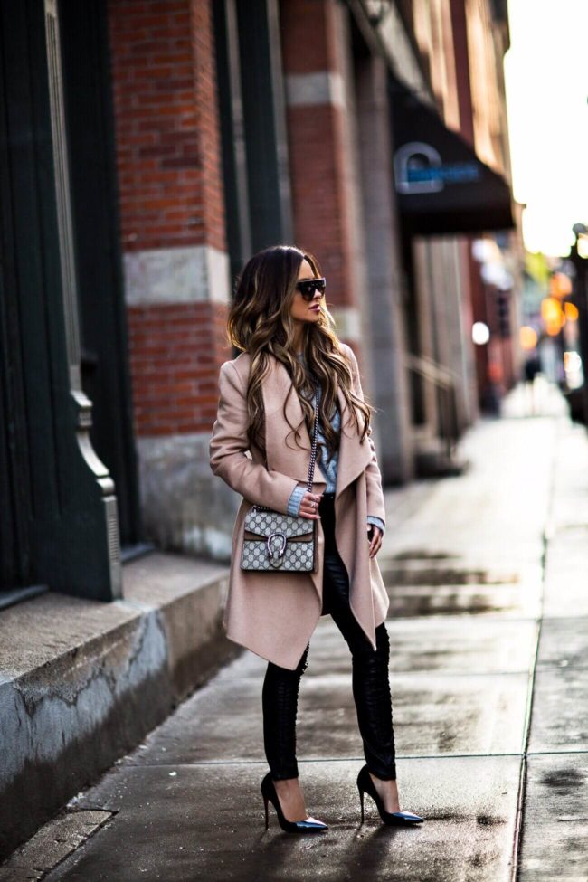 fashion blogger mia mia mine wearing a camel coat and gucci mini dionysus bag