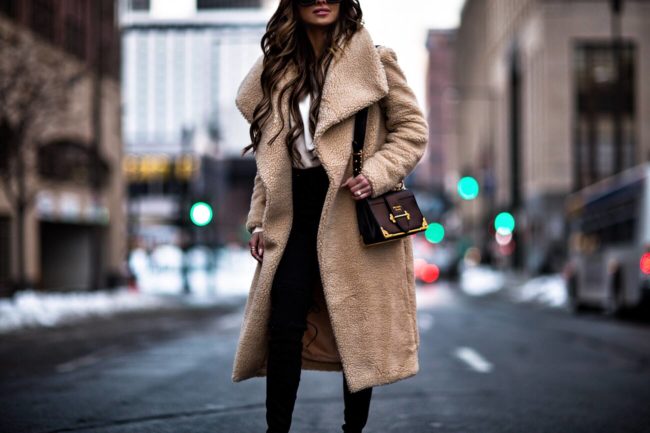 mia mia mine wearing a teddy bear coat