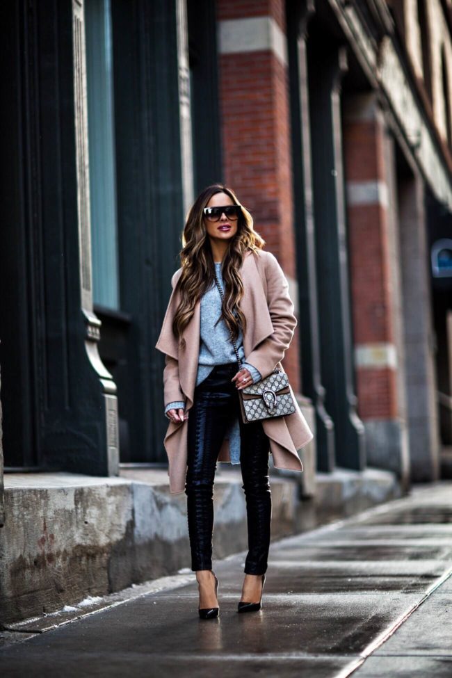 fashion blogger mia mia mine wearing a camel coat from nordstrom and black christian louboutin heels
