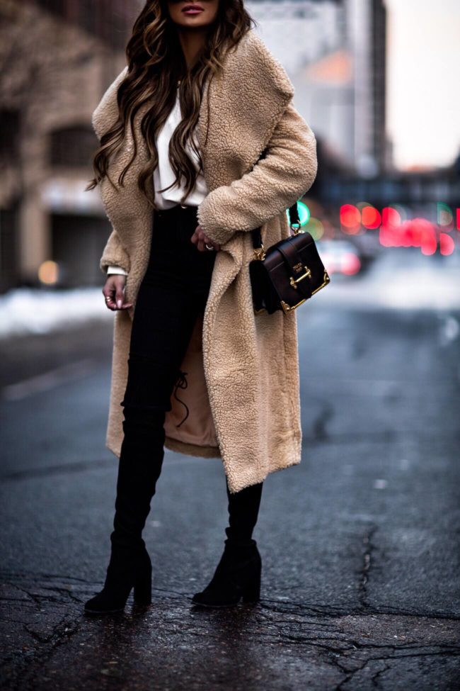 fashion blogger mia mia mine wearing a prada cahier bag