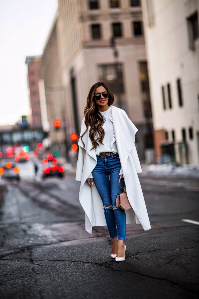 fashion blogger mia mia mine wearing a white coat and pink chloe faye bag