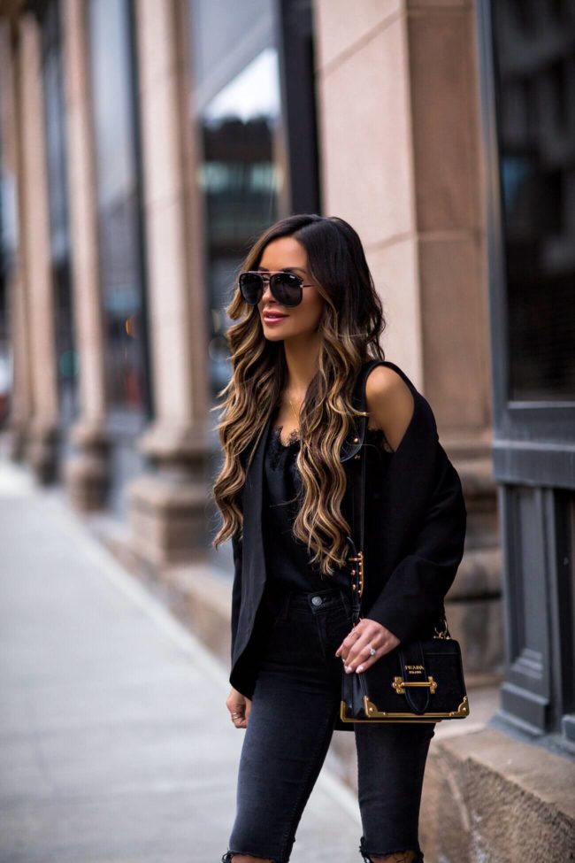 fashion blogger mia mia mine wearing quay sunglasses and a prada cahier bag