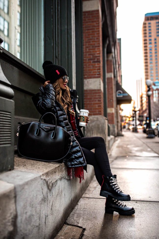 fashion blogger mia mia mine wearing a hiker boots by steve madden and a black puffer jacket from walmart