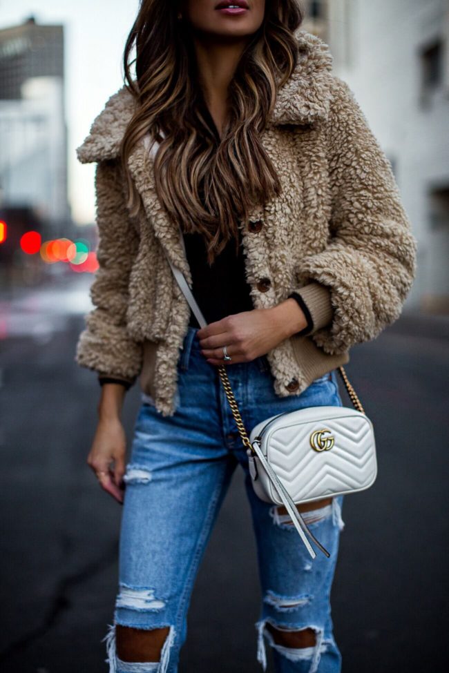 fashion blogger mia mia mine wearing a white gucci marmont mini bag