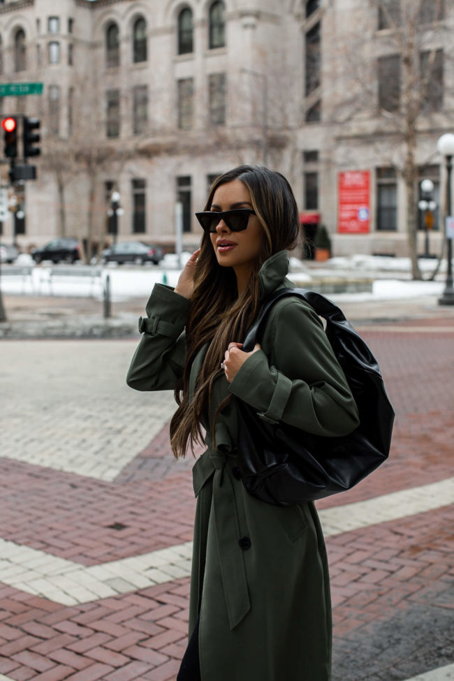 mia mia mine wearing a slouchy bag from express