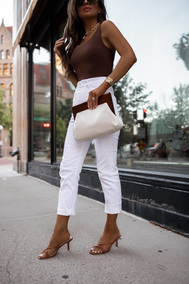 fashion blogger mia mia mine wearing white denim from express