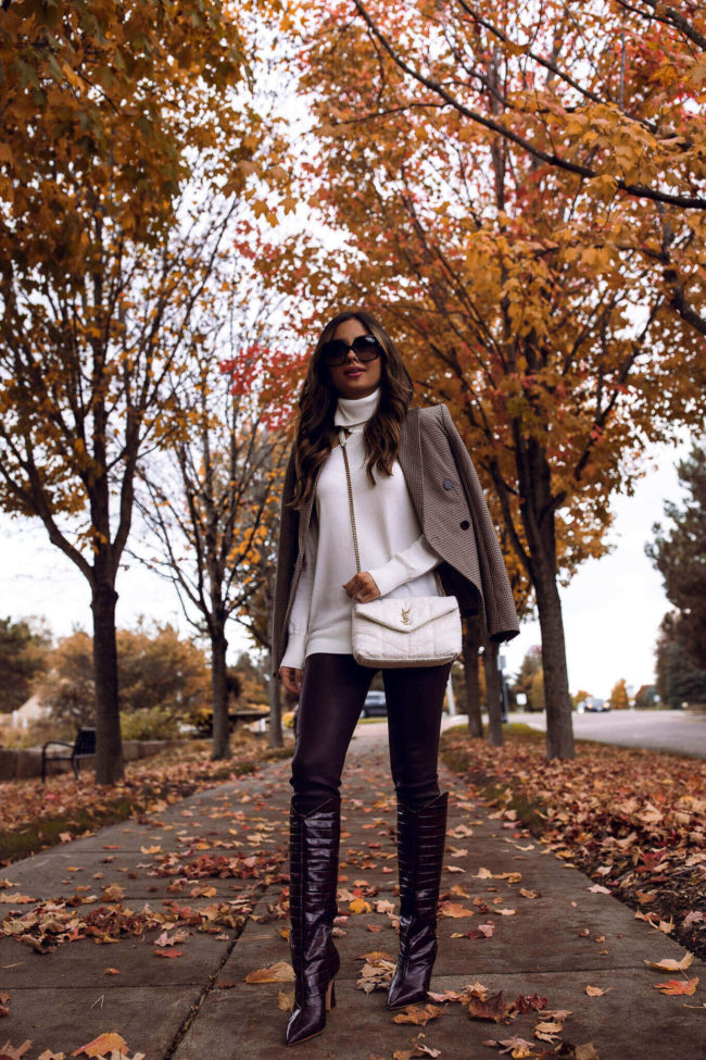 mia mia mine wearing schutz croc boots from saks fifth avenue