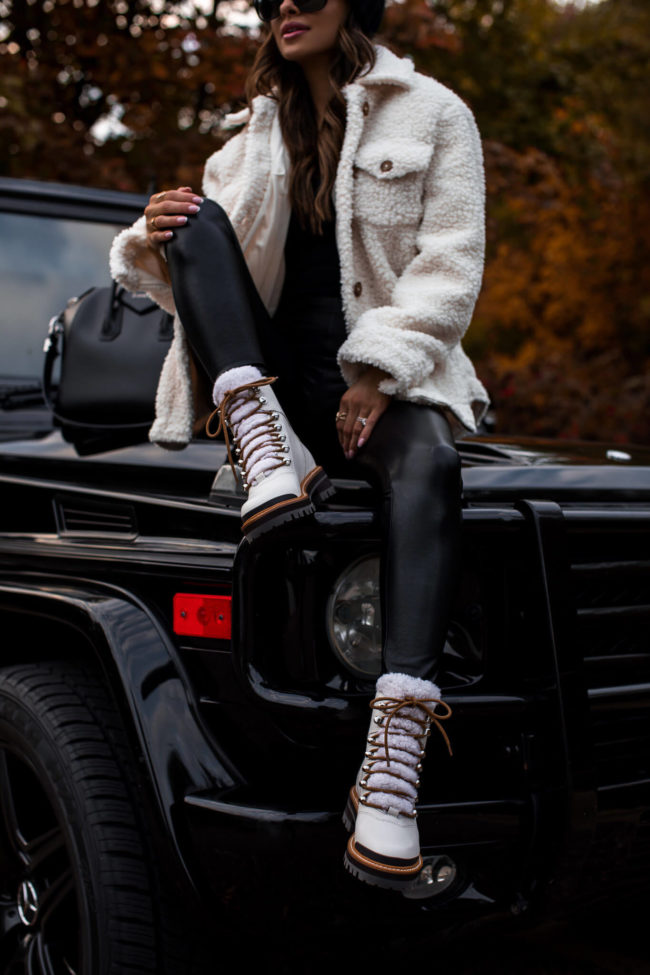 fashion blogger wearing white shearling lace up booties from nordstrom