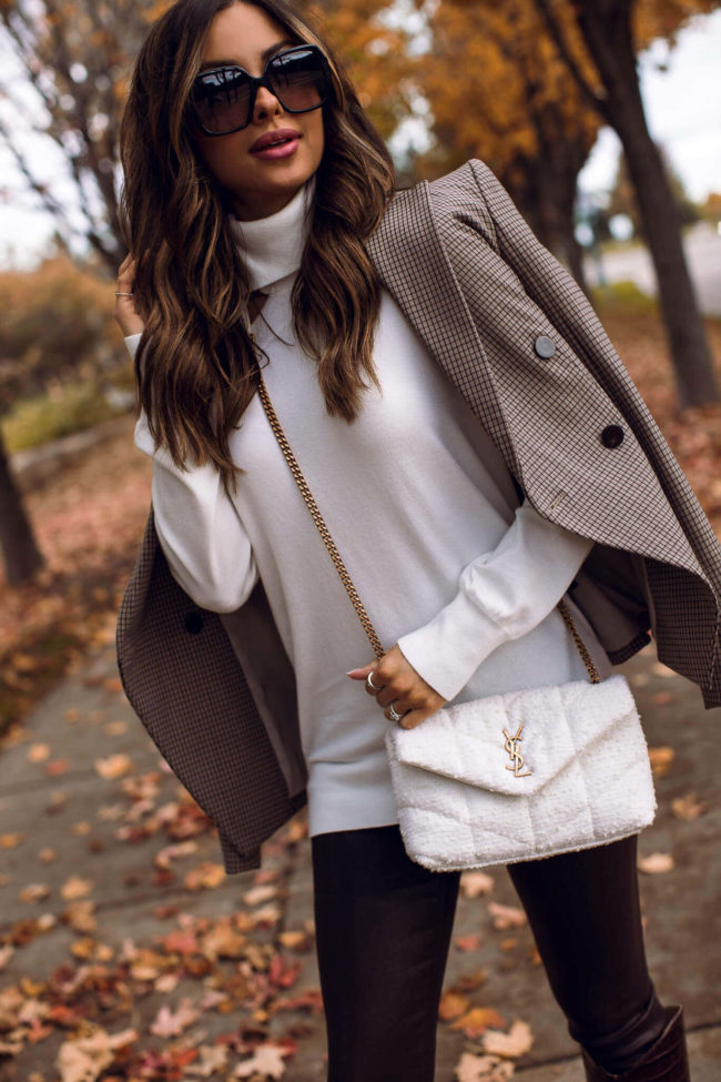 fashion blogger wearing a saint laurent toy puffer bag