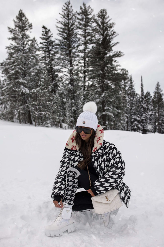 fashion blogger wearing a ski suit by perfect moment in jackson hole