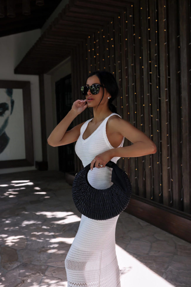 fashion blogger mia mia mine wearing a white crochet dress from walmart