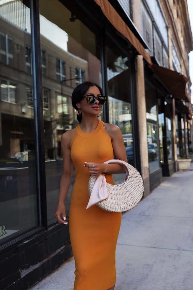fashion blogger mia mia mine wearing a yellow dress