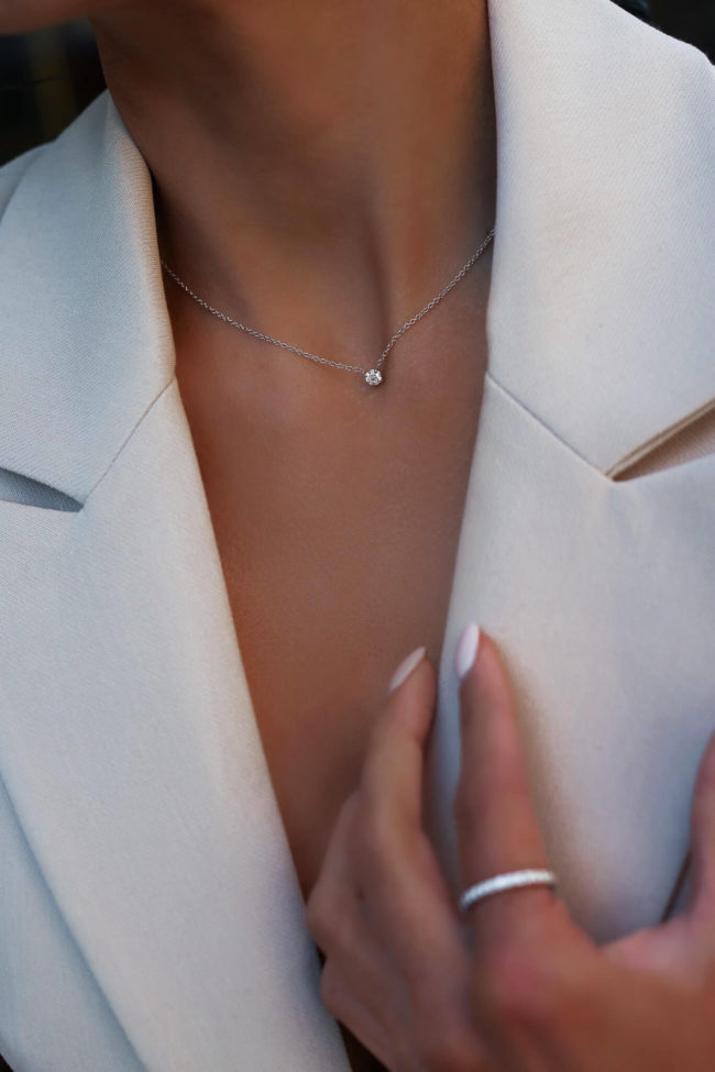 fashion blogger mia mia mine wearing a james allen delicate diamond necklace