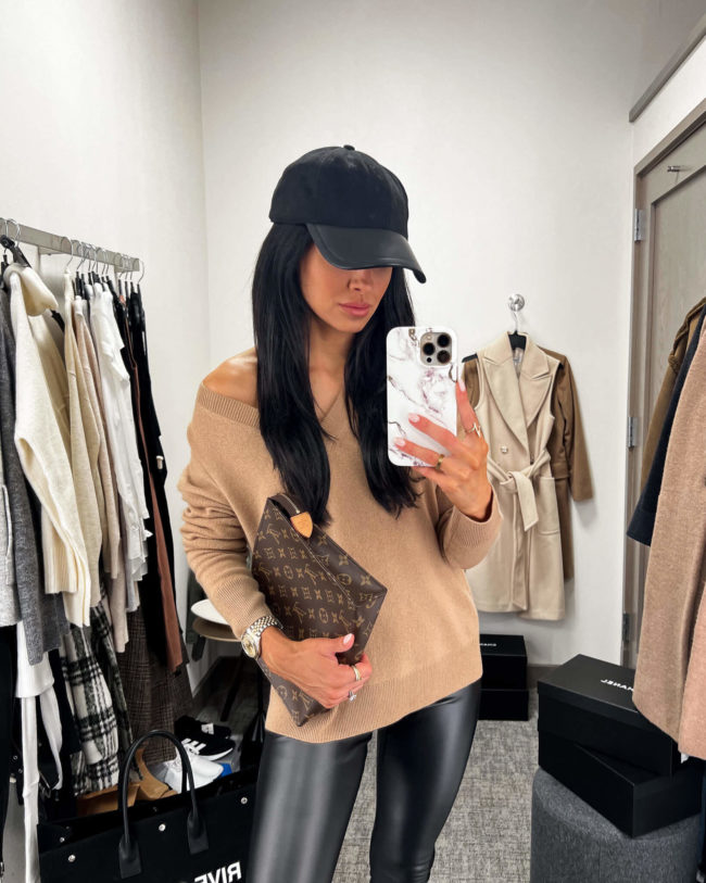 fashion blogger mia mia mine wearing a camel sweater from the nsale 2022