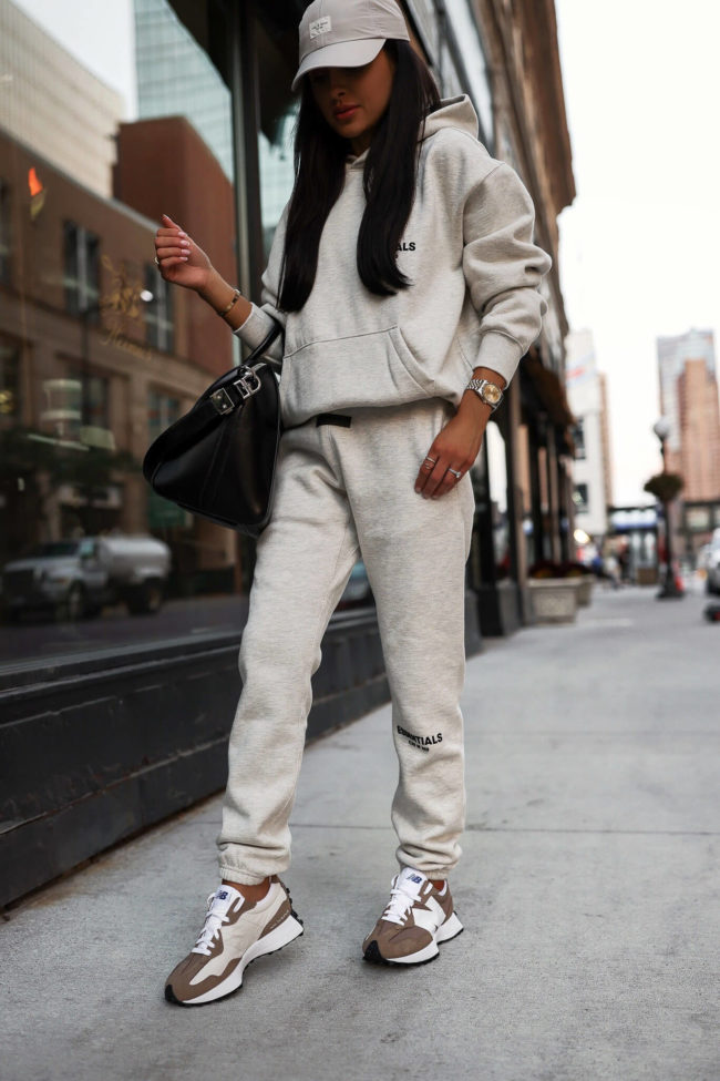 fashion blogger mia mia mine wearing a sweatsuit from ssense