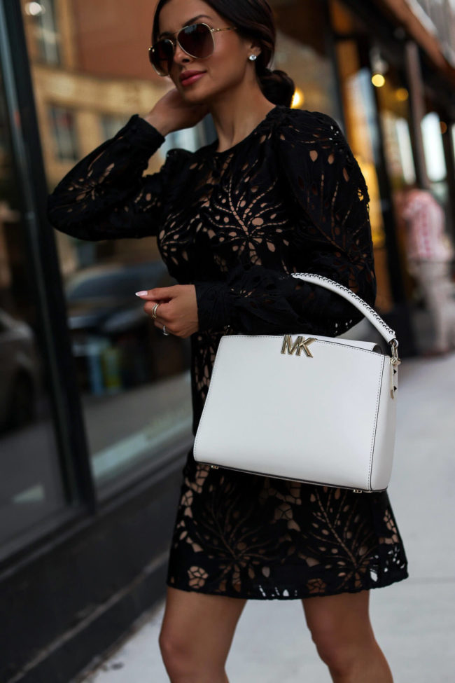 fashion blogger mia mia mine wearing a white karlie bag
