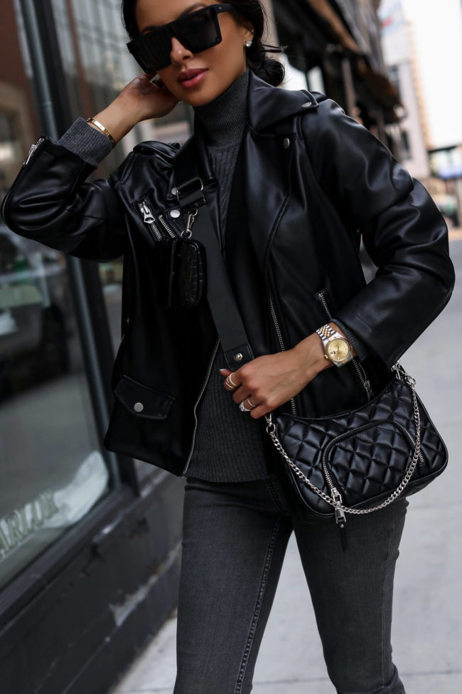 fashion blogger mia mia mine wearing a faux leather moto jacket from walmart