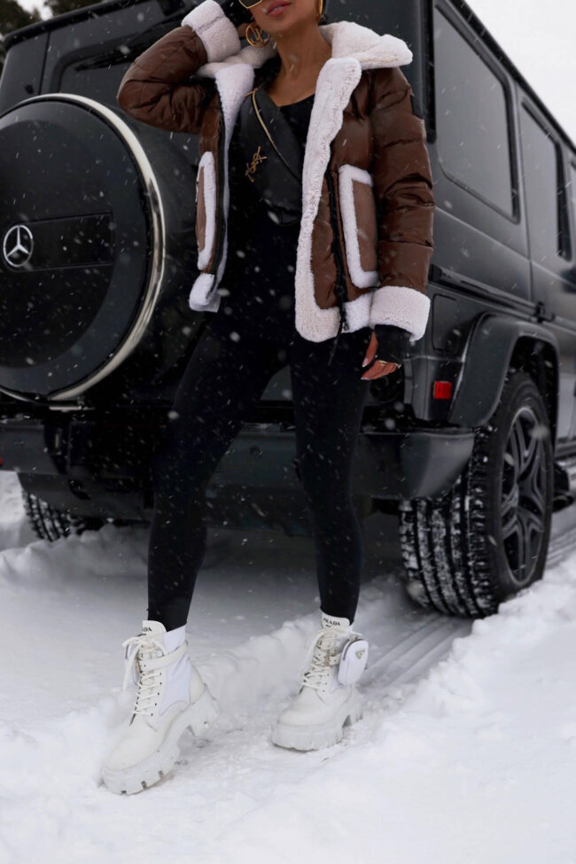 fashion blogger wearing prada white monolith boots