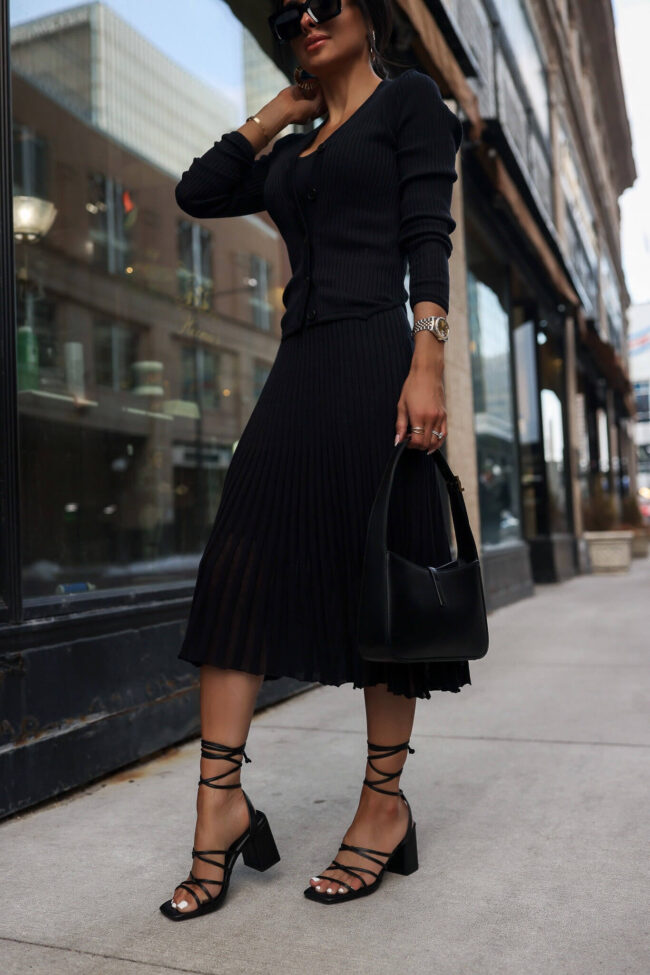 fashion blogger mia mia mine wearing a black knit skirt from walmart