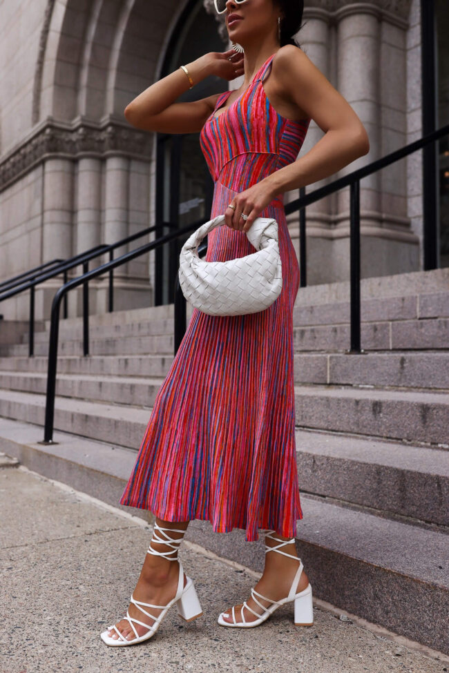 fashion blogger mia mia mine wearing a pink striped dress by scoop