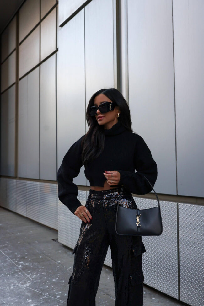 fashion blogger mia mia mine wearing an alc cropped sweater from saks