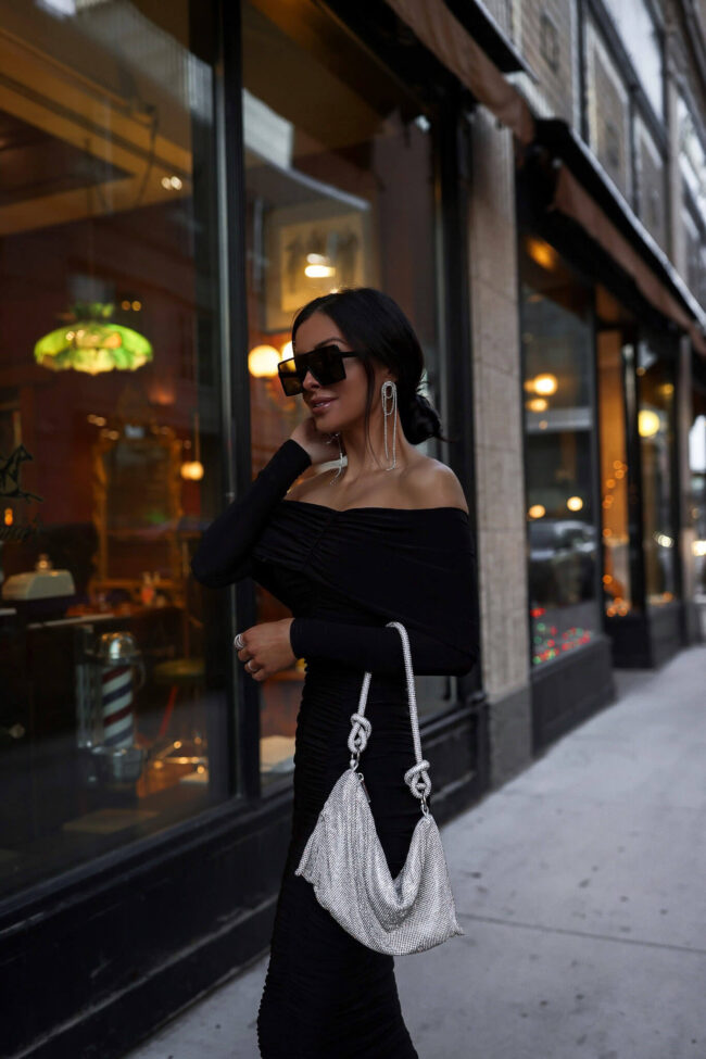 fashion blogger mia mia mine wearing an off the shoulder jersey dress from nordstrom