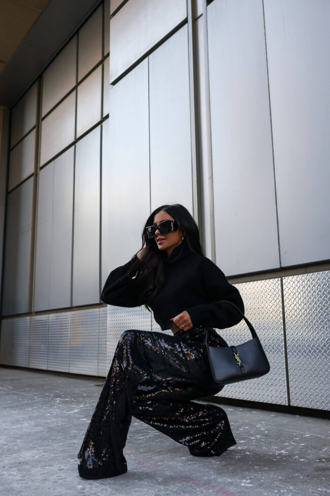 brunette fashion blogger wearing sequin cargo pants from saks