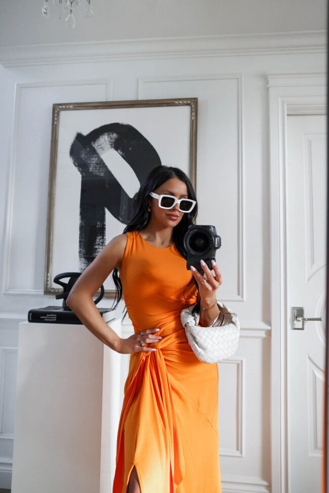 fashion blogger mia mia mine wearing an orange dress from walmart 