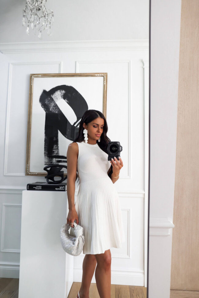 fashion blogger mia mia mine wearing a white knit dress from walmart for summer