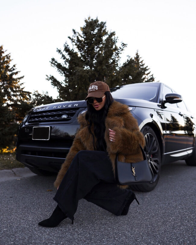 mia mia mine wearing suede boots from nordstrom