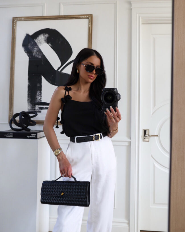 mia mia mine wearing a black and white outfit for spring