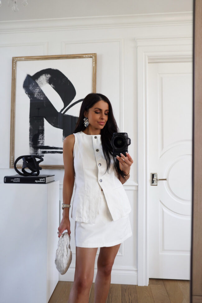 fashion blogger mia mia mine wearing a scoop vest top from walmart