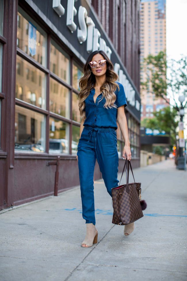 fashion blogger maria vizuete in a denim jumpsuit from asos and sole society booties