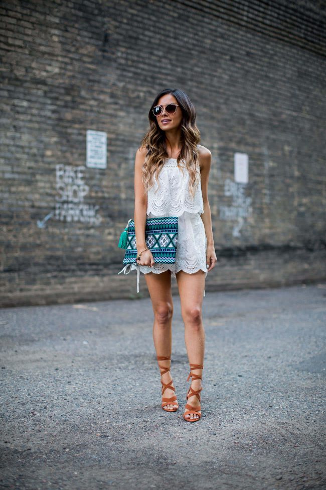 fashion blogger mia mia mine in a white lace romper from revolve and wearing sole society lace-up sandals