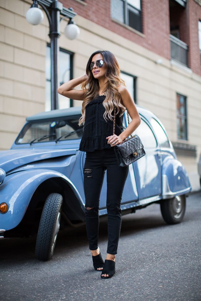 fashion blogger mia mia mine in a black topshop halter top and black ripped jeans