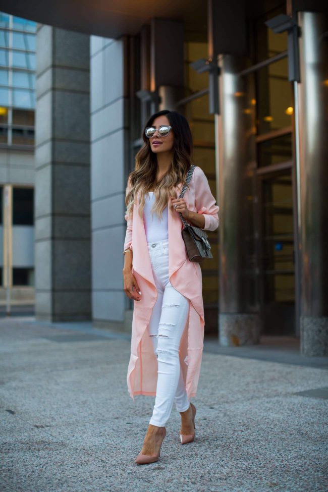 fashion blogger mia mia mine wearing a pink duster by missguided