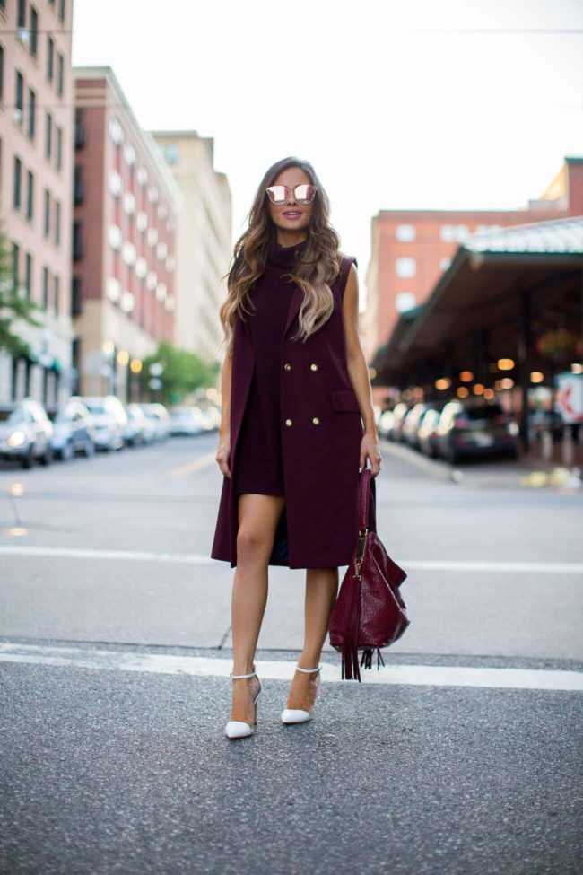 fashion blogger mia mia mine in a burgundy sleeveless trench from nordstrom anniversary sale