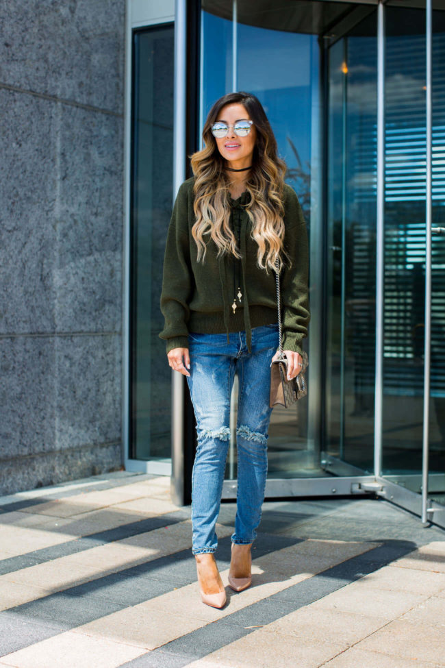 mia mia mine wearing a lace-up khaki sweater and one teaspoon jeans from shopbop