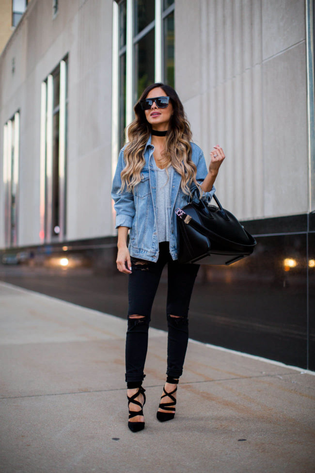 fashion blogger mia mia mine in an oversized jacket and black denim jeans by topshop