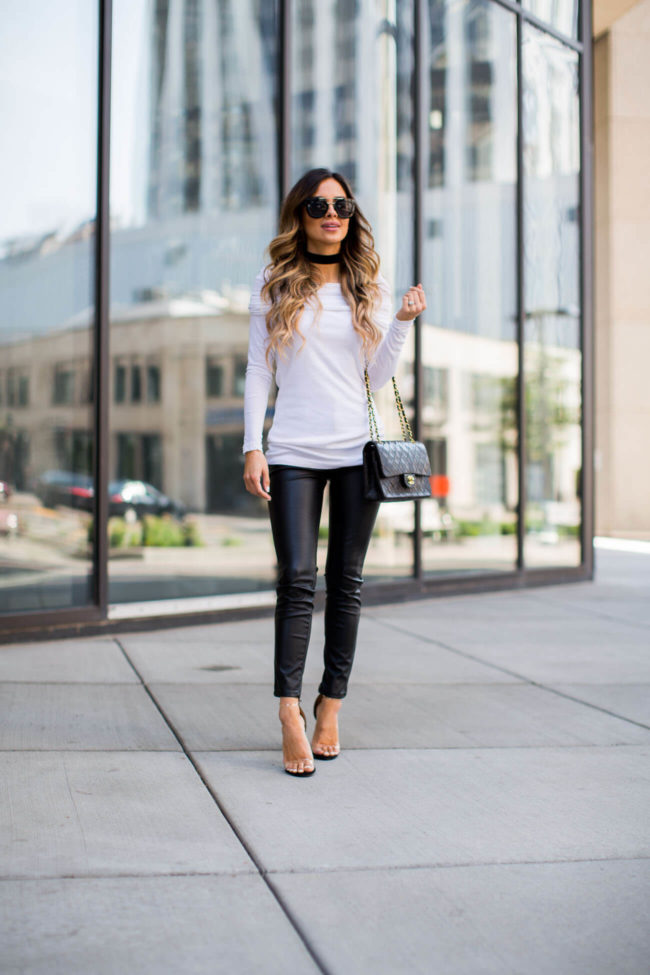 fashion blogger mia mia mine in a white off-the-shoulder top and black velvet choker from shopbop