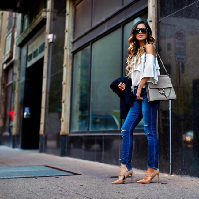 mia mia mine wearing a cold-shoulder top from nordstrom and sam edelman helaine heels