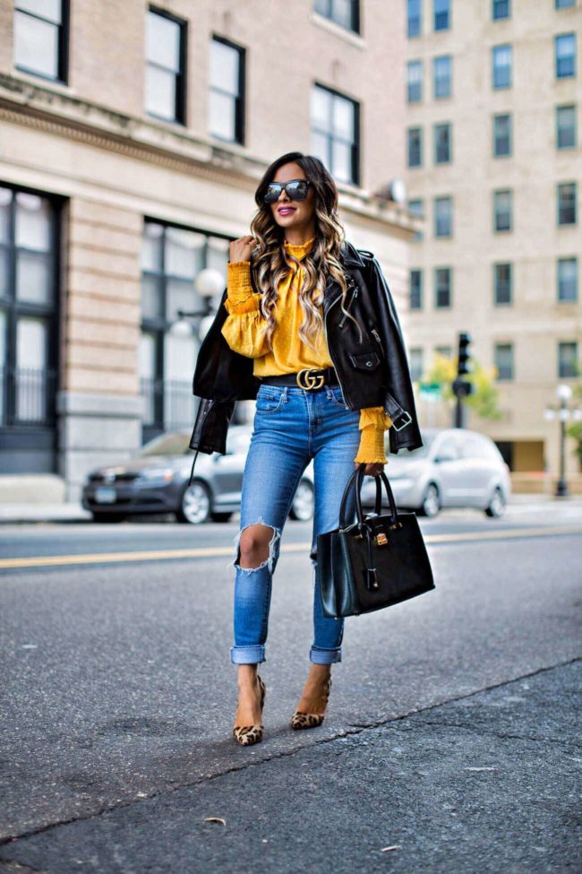 fashion blogger mia mia mine in a yellow top from shopbop and saint laurent sunglasses from nordstrom