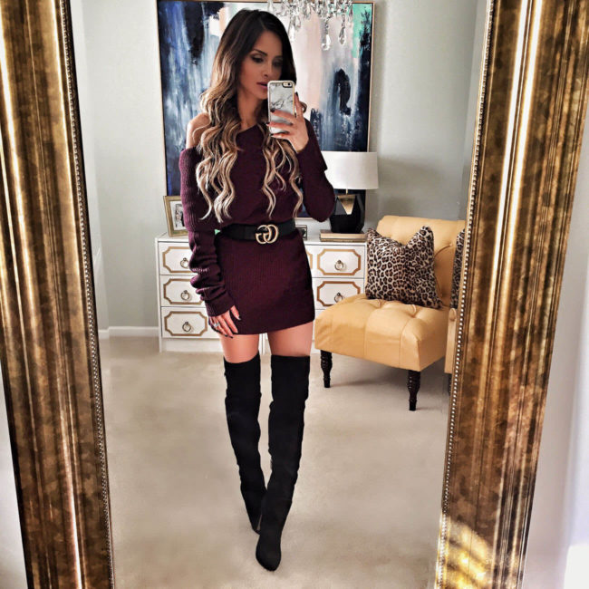 Mia mia mine wearing a burgundy sweater dress and gucci double g buckle belt instagram