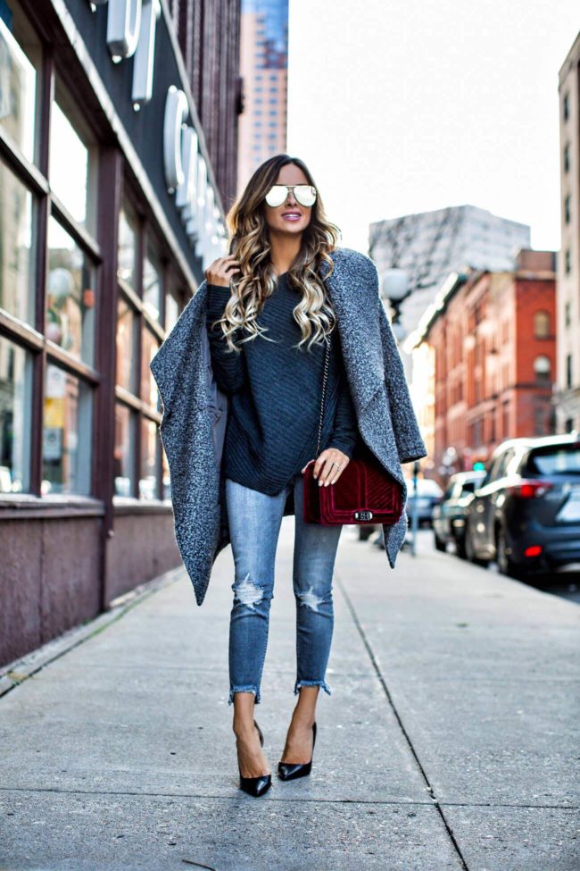 fashion blogger mia mia mine wearing a wrap coat from H&M and a burgundy velvet bag by rebecca minkoff