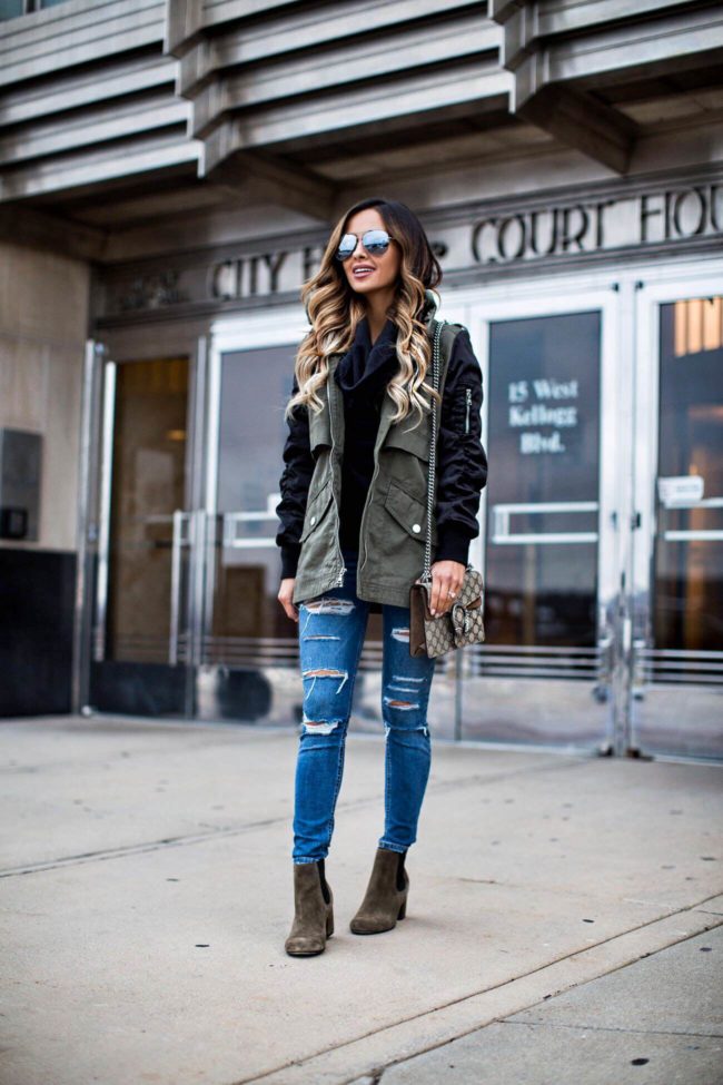 Fashion blogger Mia Mia Mine wearing a Black Friday jacket from Express