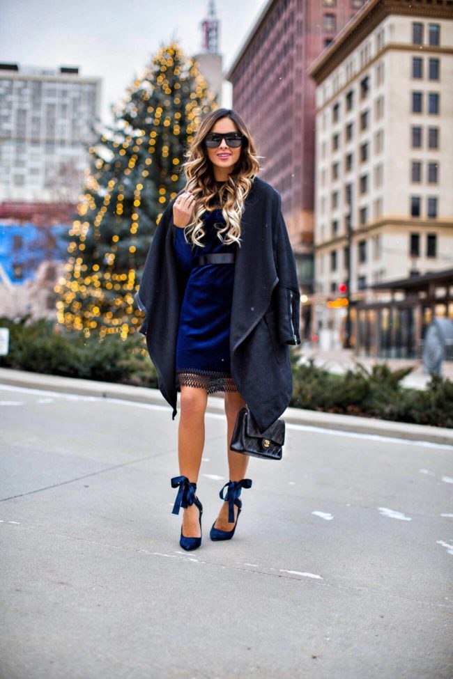 fashion blogger mia mia mine wearing a holiday party dress from nordstrom and a chanel bag